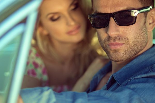 Serious handsome man and his lovely wife