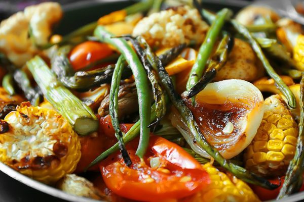 Grilled vegetables in frying pan, close up