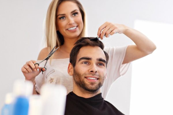 Picture showing adult man at the hair salon