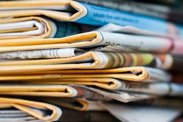 Big pile of newspapers, focus in front