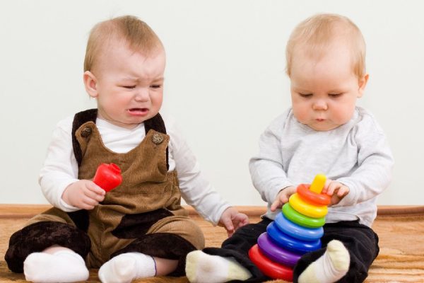 two children shared a toy