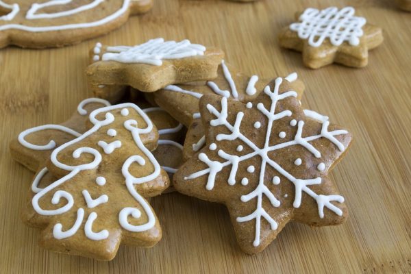 Painted light brown ginger breads, white icing, Christmas cookies, shapes - star, tree, horse