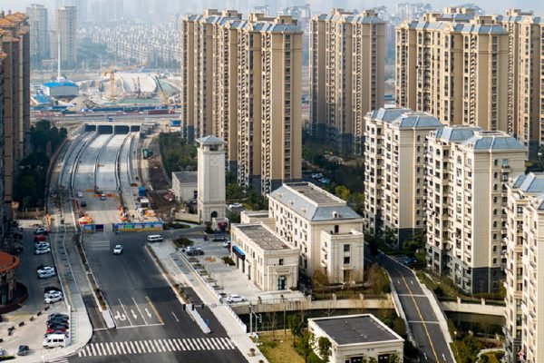 aerial view of the district in Shanghai with roads and high-rise buildings.