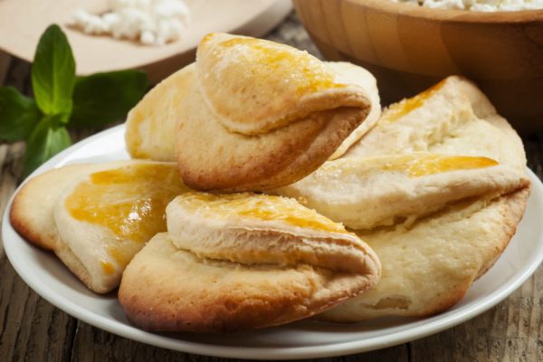 traditional Russian cuisine homemade biscuits with cheese, selective focus