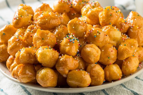 Homemade Sweet Italian Struffoli with Honey and Sprinkles