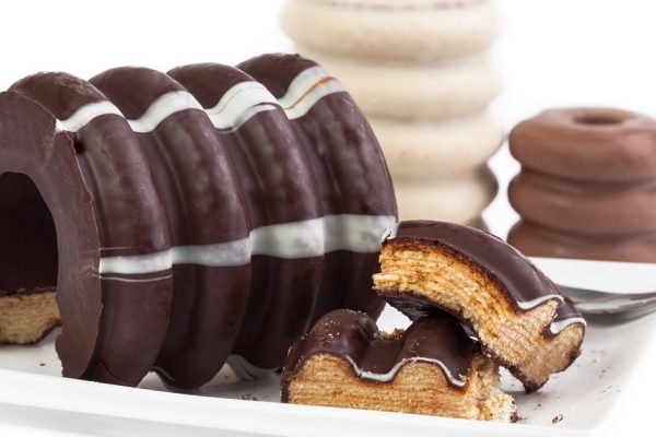 German Christmas / winter specialty - "Baumkuchen" - Layer cake  isolated on white background.