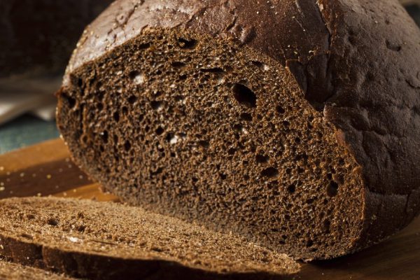 Homemade Organic Pumpernickel Rye Bread Cut into Slices