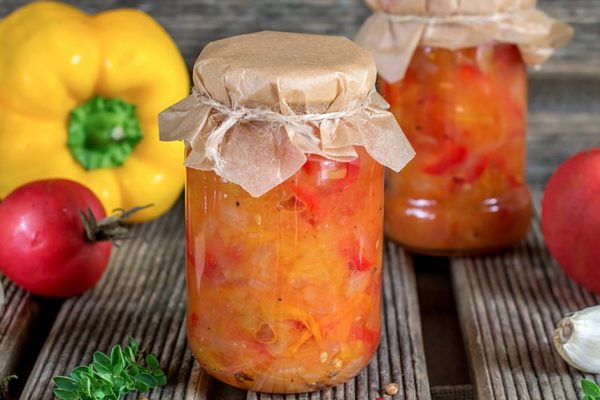 Canned tomato stew salad with sweet pepper Lecho/Lecso and vegetables