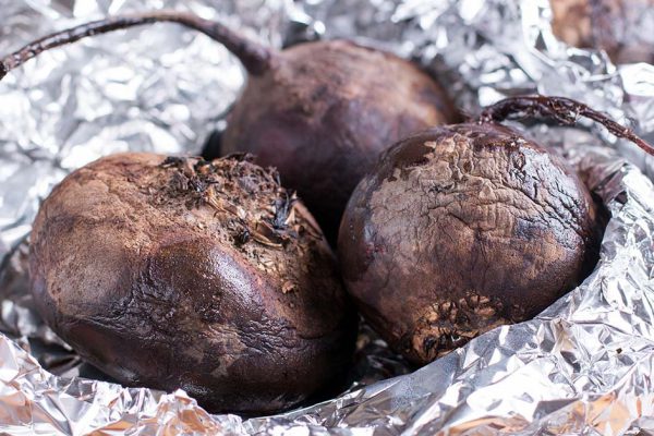 Annoyed adult daughter arguing with stubborn old senior mother in law ignoring not listening to young woman talking explaining problem, different generations disagreements family conflicts concept