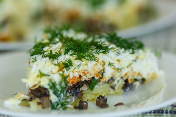 vegetable salad layered with mushrooms and vegetables