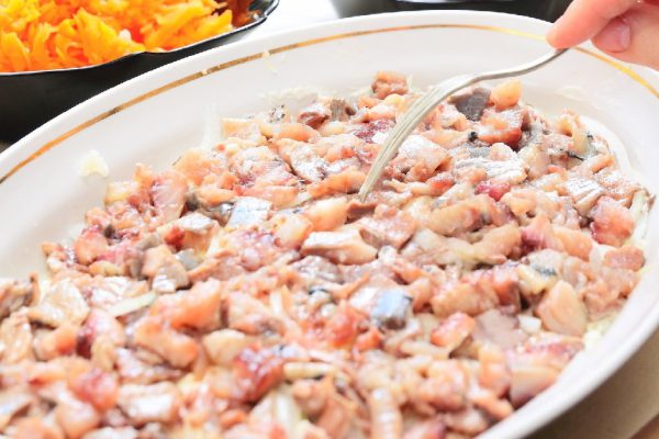 Ingredients for preparing russian traditional salad 'herring under fur coat'