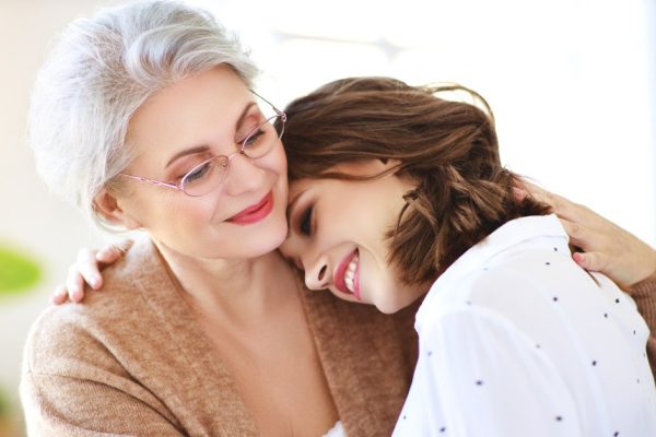 Happy family two generations old mother and adult daughter