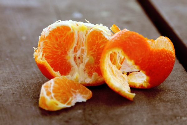 tangerines on a natural wooden table
