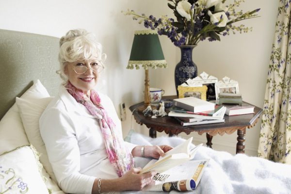 Senior Woman Relaxing with a Book