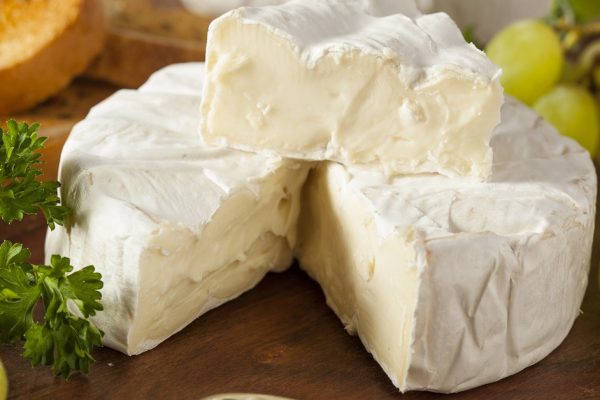 Organic Homemade White Brie Cheese with Bread and Grapes