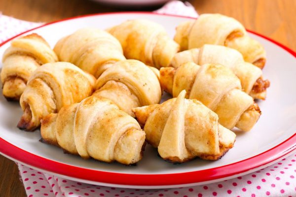 Cinnamon  and apple filling crescents on plate