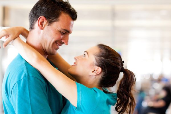 loving young couple say good bye at airport