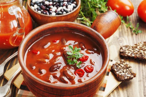 Chili soup with red beans and greens. Mexican cuisine