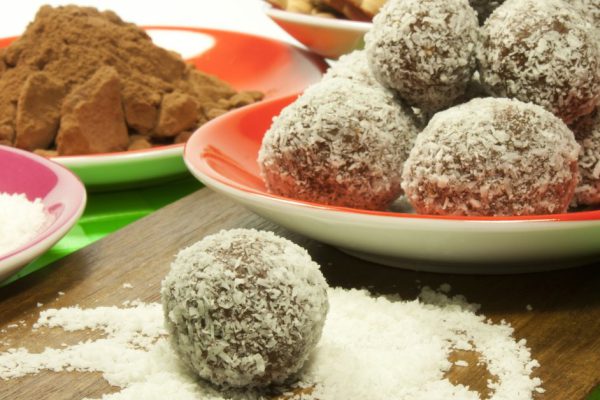 sweet chocolate balls covered in coconut flakes.