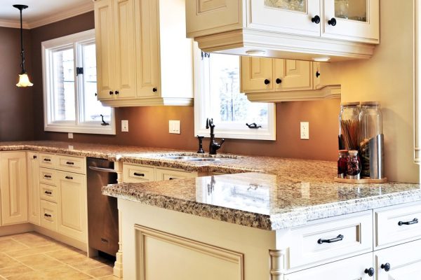 Interior of modern luxury kitchen with granite countertop