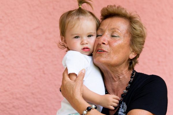 Grandmother loves her grandkid while showing her true feelings.