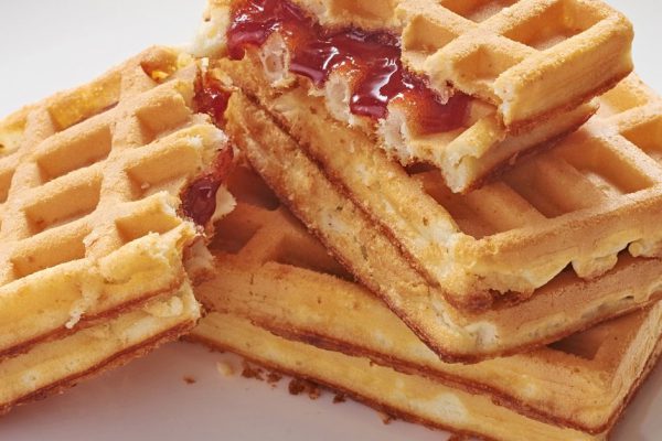 wafers with cherry jam on a plate, special framing