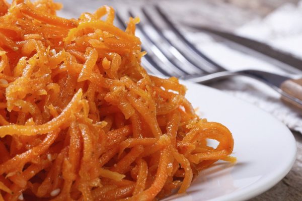 grated carrots with spices Korean closeup. macro