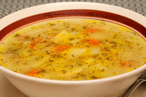 The bowl of fresh chicken soup, shallow focus