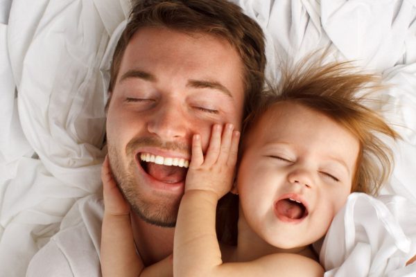 Father and daughter laughing and bonding