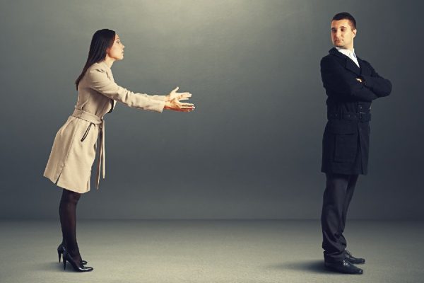 young beautiful woman asking for forgiveness