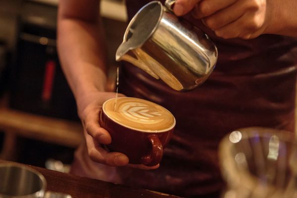 TOKYO, JAPAN - MAY 20:  Barista Takaya Hashimoto prepares a cafe latte at a local specialty coffee shop on May 20, 2016 in Tokyo, Japan. With the rise of specialty coffee shops opening all over the world in recent years, Tokyo's coffee culture catches on to offer quality coffee to like minded people across all walks of life. (Photo by Christopher Jue/Getty Images)