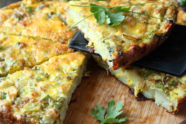 Italian Frittata with slices of fresh greens, food